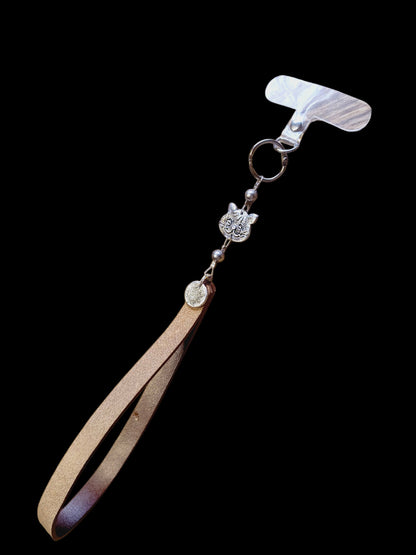 Cirmos csuklóra akasztható valódi bőr telefontartó