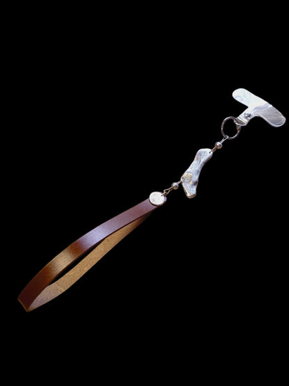 Pecsét csuklóra akasztható valódi bőr telefontartó