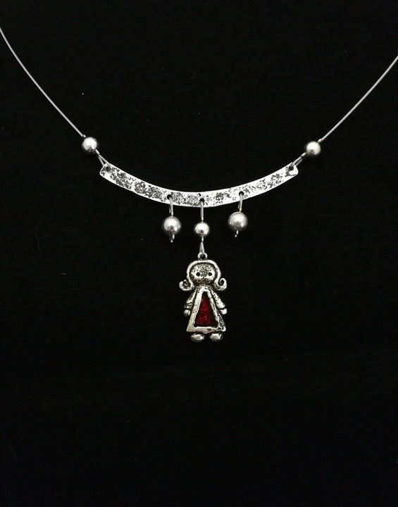 Labdázó kislány nyaklánc