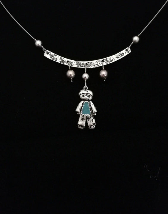 Labdázó kisfiú nyaklánc